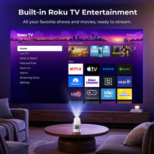 White projector on a table showing a Roku TV menu screen with room setup