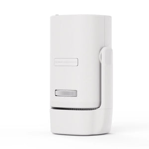 White projector rear view with handle and ventilation grille, compact build